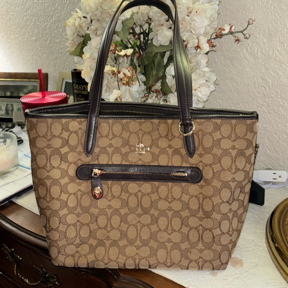 Coach Signature fabric monogram Taylor Tote turn lock